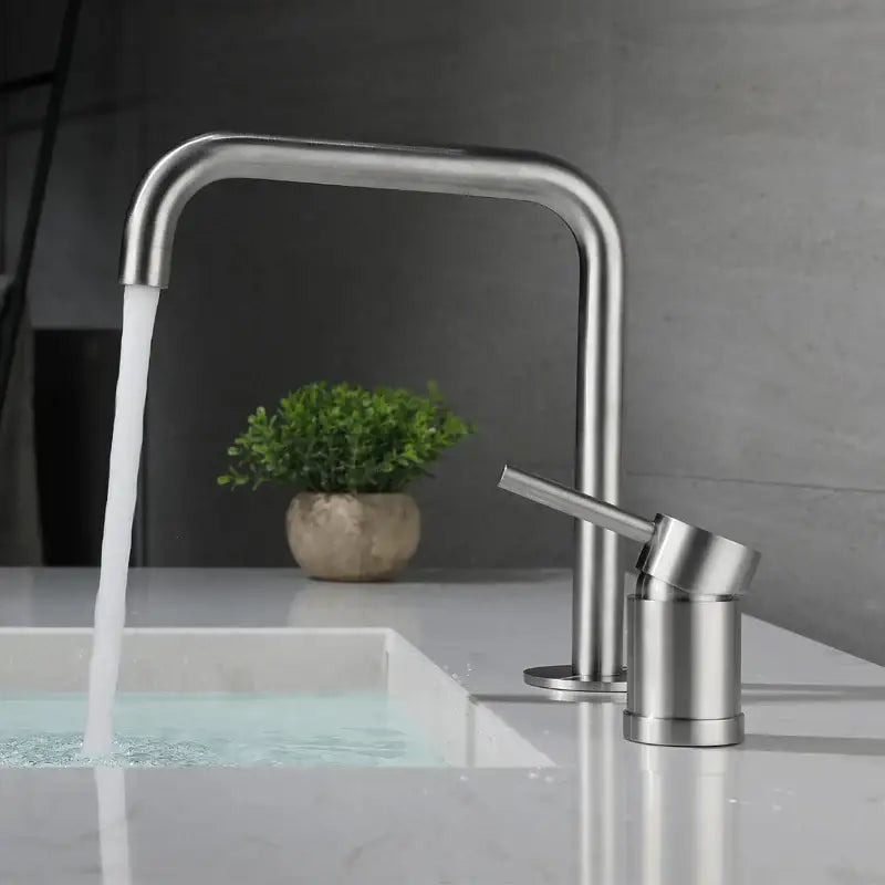 Modern brushed stainless steel kitchen faucet with curved spout