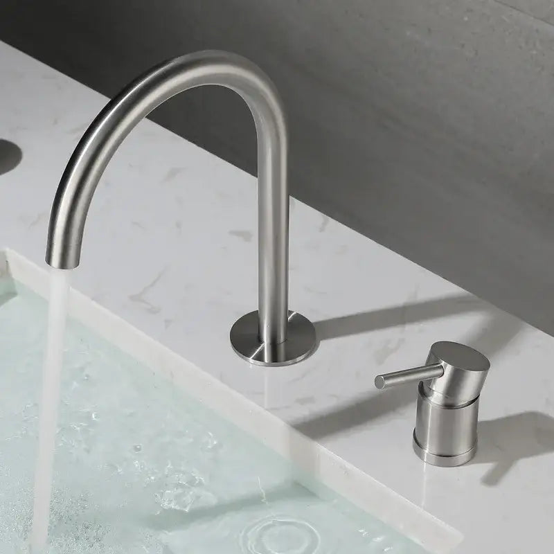 Modern brushed stainless steel kitchen faucet with curved spout
