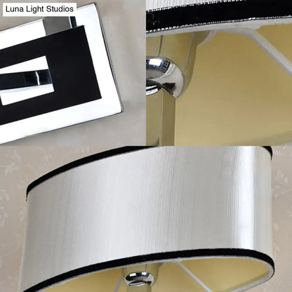 Modern chrome and beige oval wall sconce bedroom light