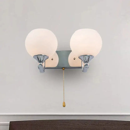 Modern chrome and cream glass wall light bedroom sconce with pull chain