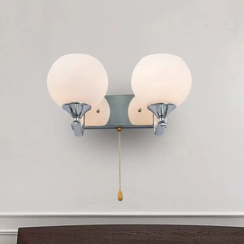Modern chrome and cream glass wall light bedroom sconce with pull chain