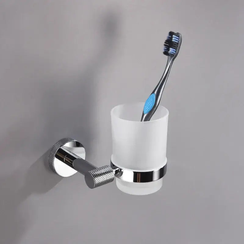 Modern chrome bathroom essentials set with soap dish and brush