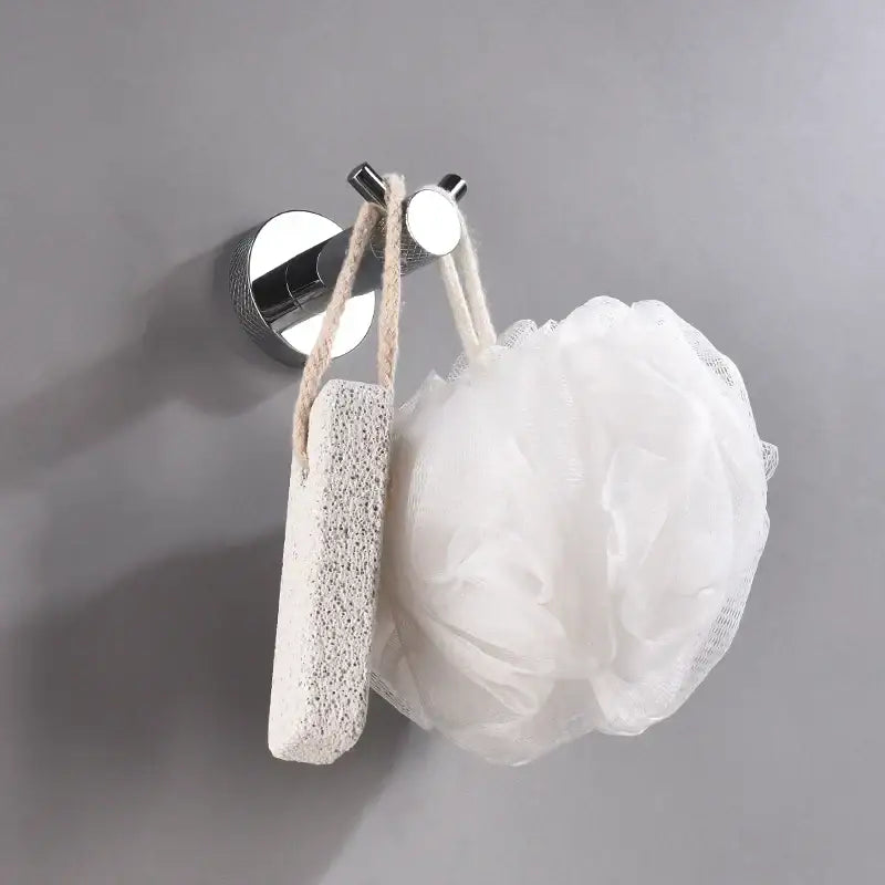 Modern chrome bathroom essentials set with soap dish and brush