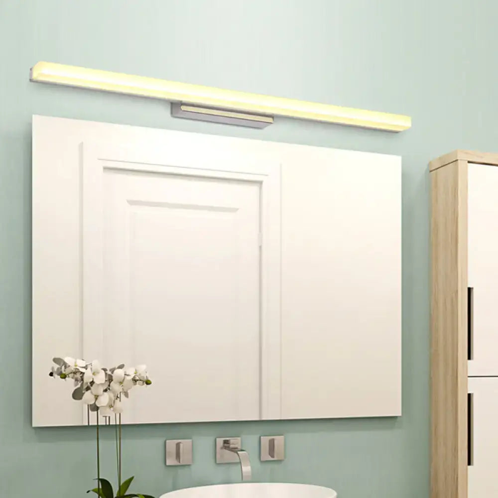 Modern chrome led wall light with streamlined metal shade bathroom