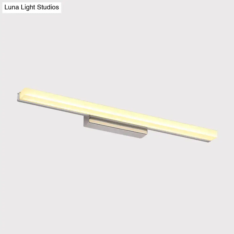 Modern chrome led wall light with streamlined metal shade bathroom