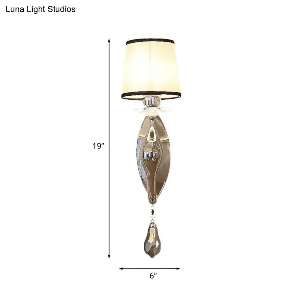 Modern chrome wall lamp with fabric shade and crystal – living room