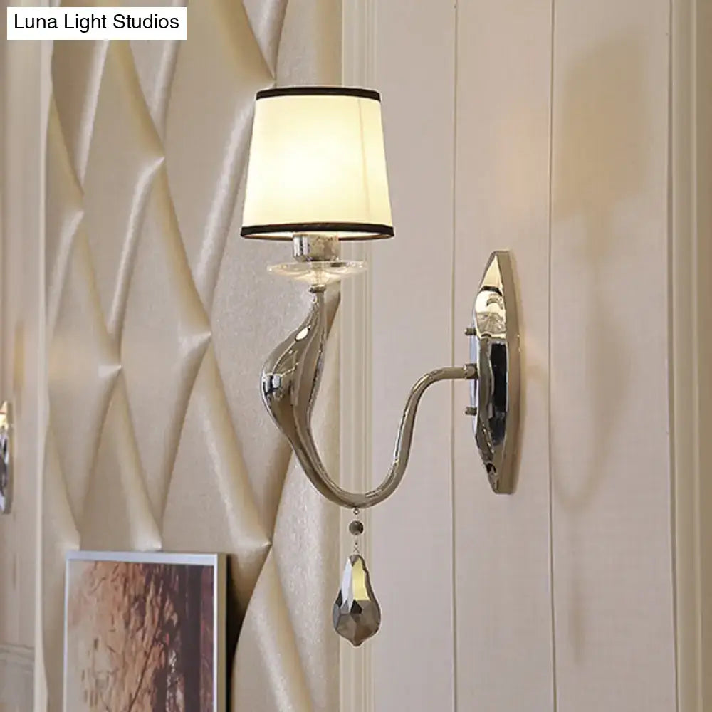 Modern chrome wall lamp with fabric shade and crystal – living room