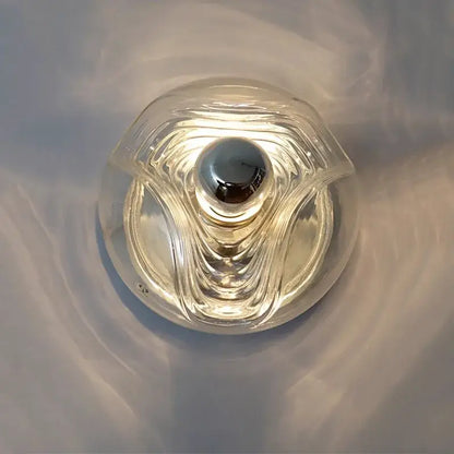 Modern circular swirling designer glass wall lamp for bedroom