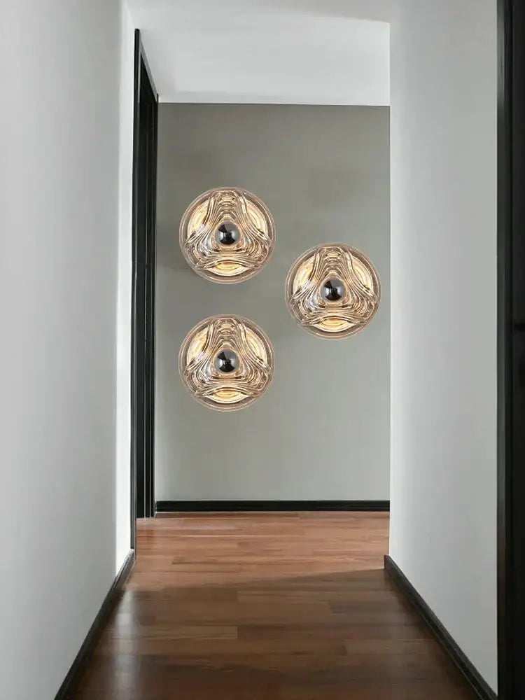 Modern circular swirling designer glass wall lamp for bedroom