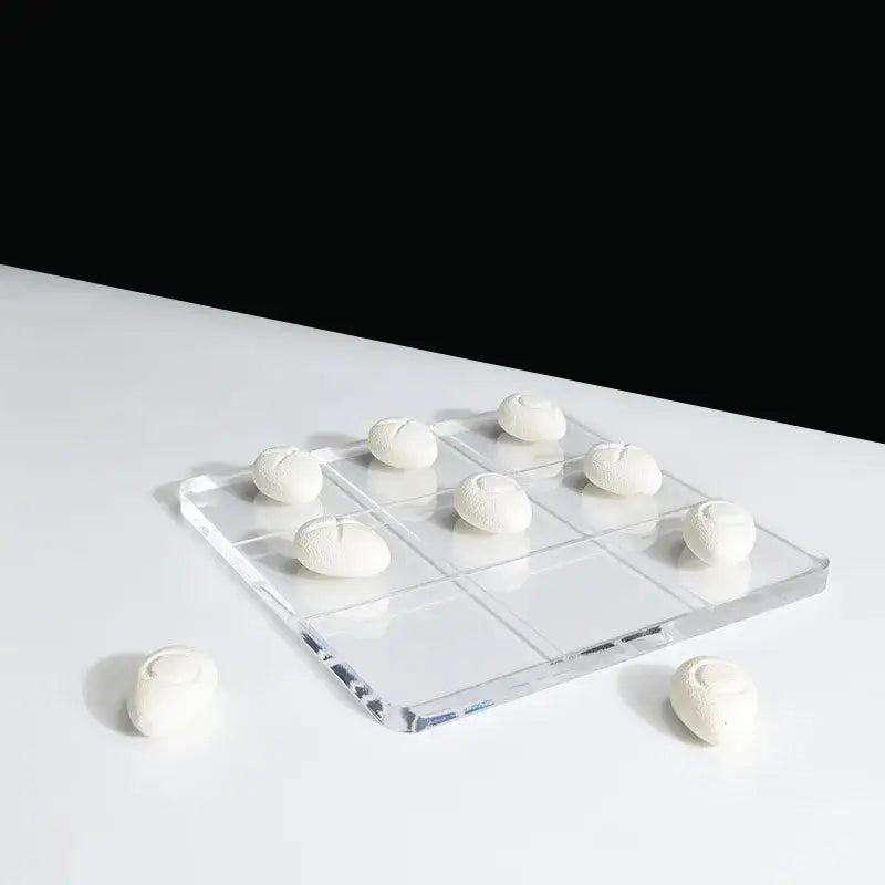 Modern clear acrylic tic tac toe board with resin pebble chess pieces living room decor