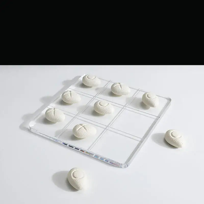 Modern clear acrylic tic tac toe board with resin pebble chess pieces living room decor