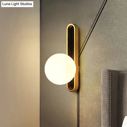 DecorBites™ Modern Clear/Cream Glass Orb Wall Light with Brass Mount