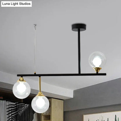 DecorBites™ Modern Clear Glass Pendant Light Fixture: 3-Bulb Globe Island Lighting in Black for Dining Room