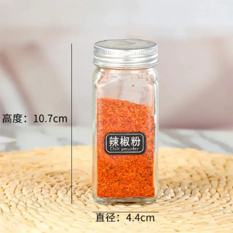 Modern clear glass seasoning jar set with black lids for kitchen