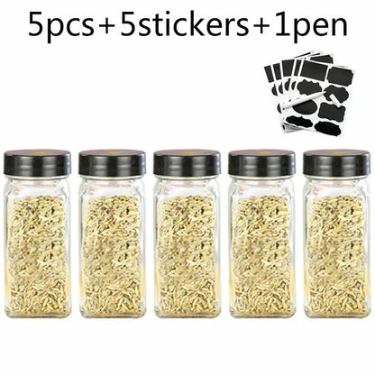 Modern clear glass seasoning jar set with black lids for kitchen