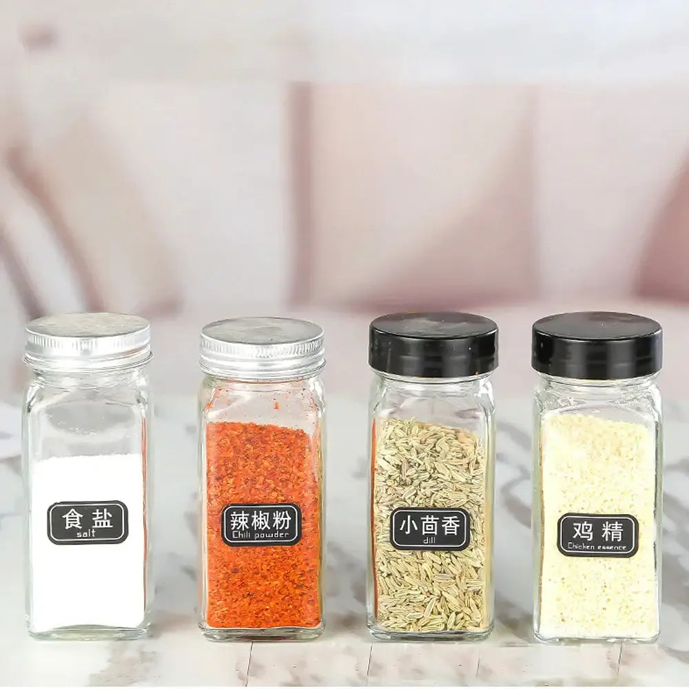 Modern clear glass seasoning jar set with black lids for kitchen