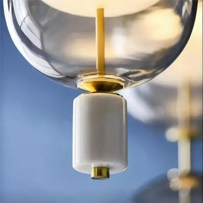 Modern clear gray amber glass pendant light dining room brass orbs