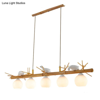 DecorBites™ Modern Cream Glass Wood Pendant Light with White Bird Deco - Dome Island Fixture
