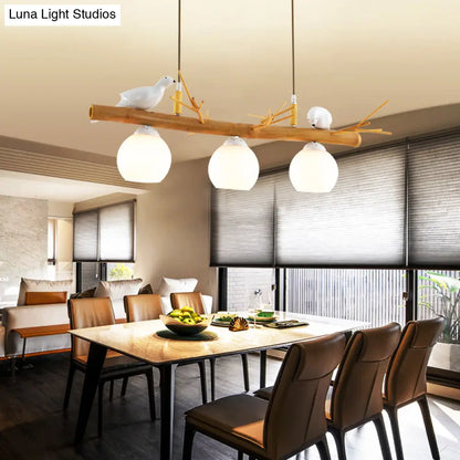 DecorBites™ Modern Cream Glass Wood Pendant Light with White Bird Deco - Dome Island Fixture