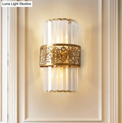 Modern crystal wall light with gold filigree band – study room sconce