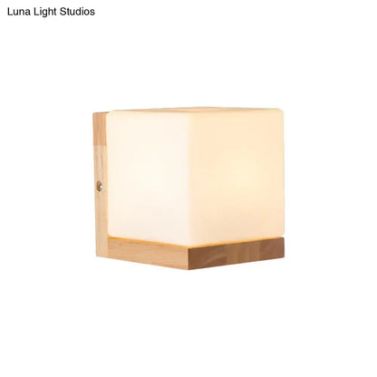 Modern cube shaped sconce wall lamp with wooden backplate bedroom light
