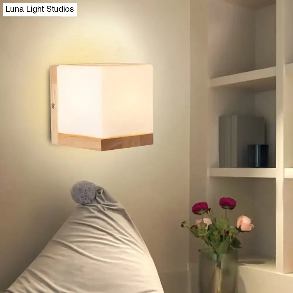 Modern cube shaped sconce wall lamp with wooden backplate bedroom light