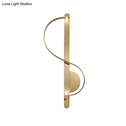 Modern curved gold wall sconce warm white light bedroom fixture
