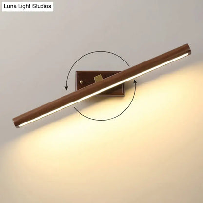 Modern dark wood linear wall sconce bathroom vanity light