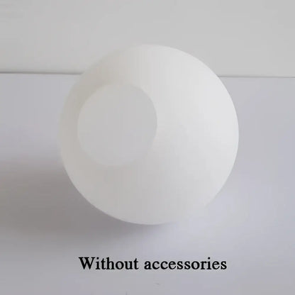 Modern frosted glass ball pendant light with gold ring for bedroom