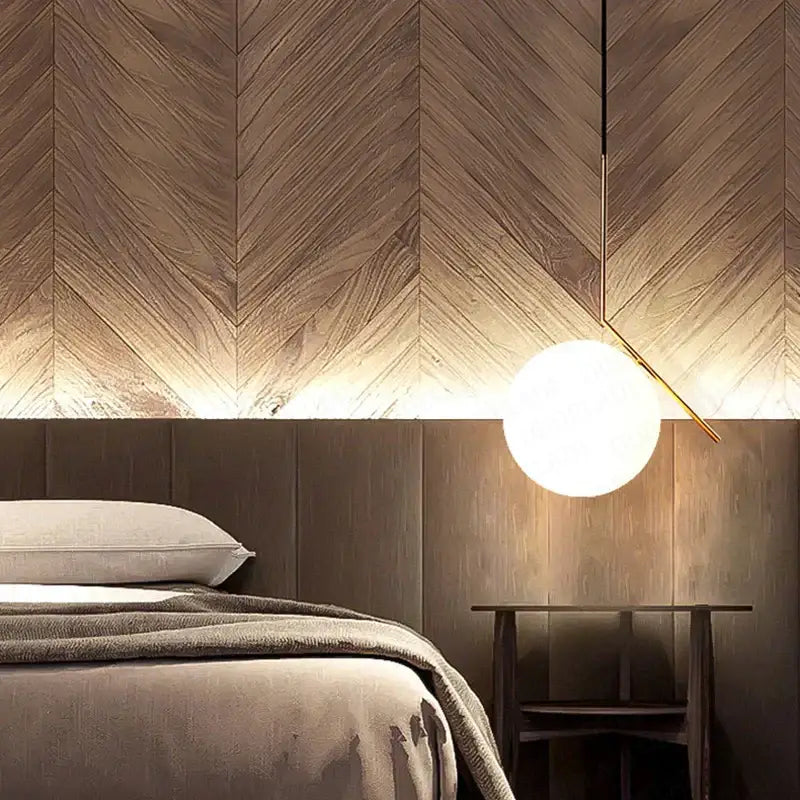 Modern frosted glass ball pendant light with gold ring for bedroom