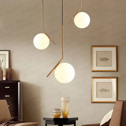Modern frosted glass ball pendant light with gold ring for bedroom