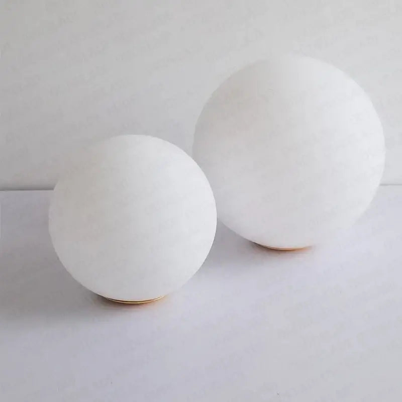 Modern frosted glass ball pendant light with gold ring for bedroom