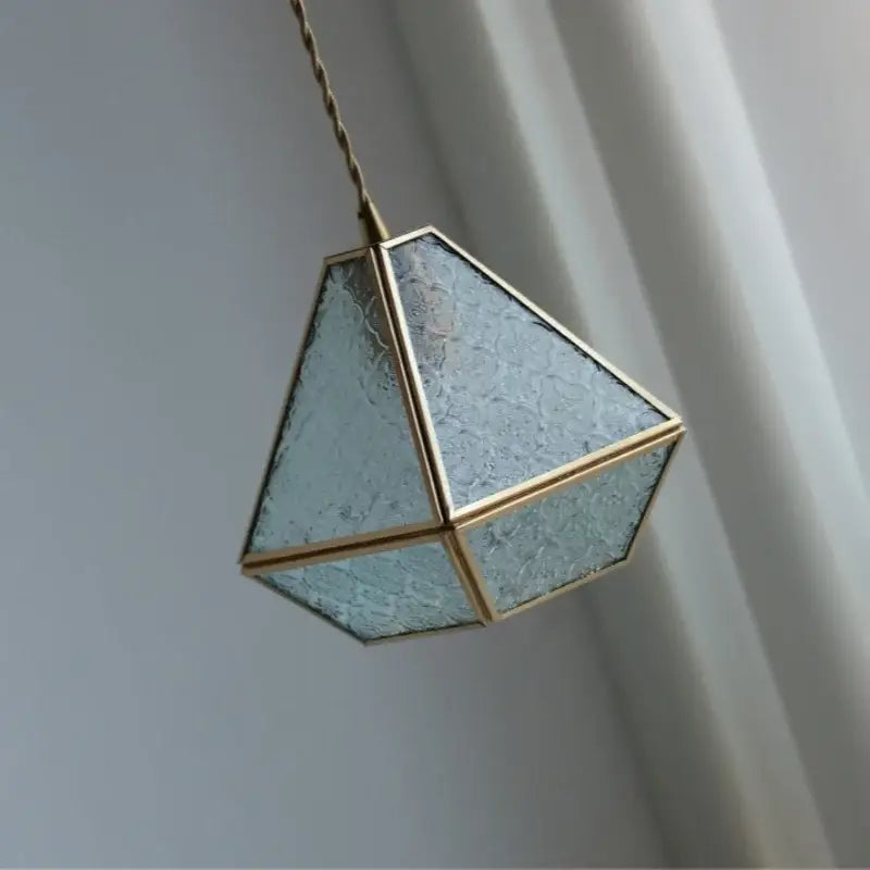 Modern geometric blue glass and brass pendant light – dining room