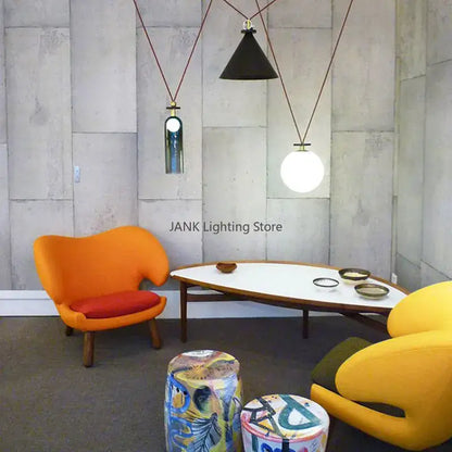 Modern geometric brass & black glass pendant light dining room