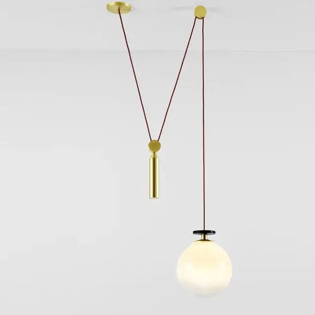 Modern geometric brass & black glass pendant light dining room