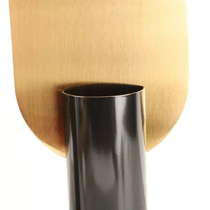 Modern geometric cylinder vase with pink artificial flowers living room