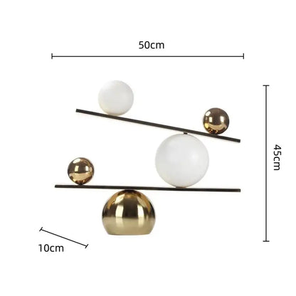 Modern geometric golden ball seesaw ramp living room sculpture