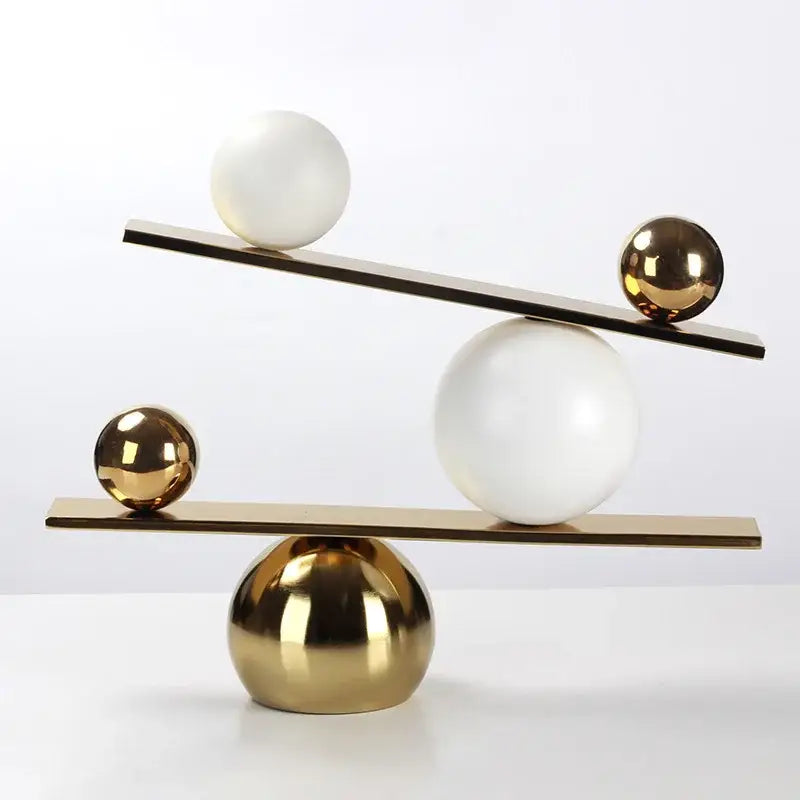 Modern geometric golden ball seesaw ramp living room sculpture