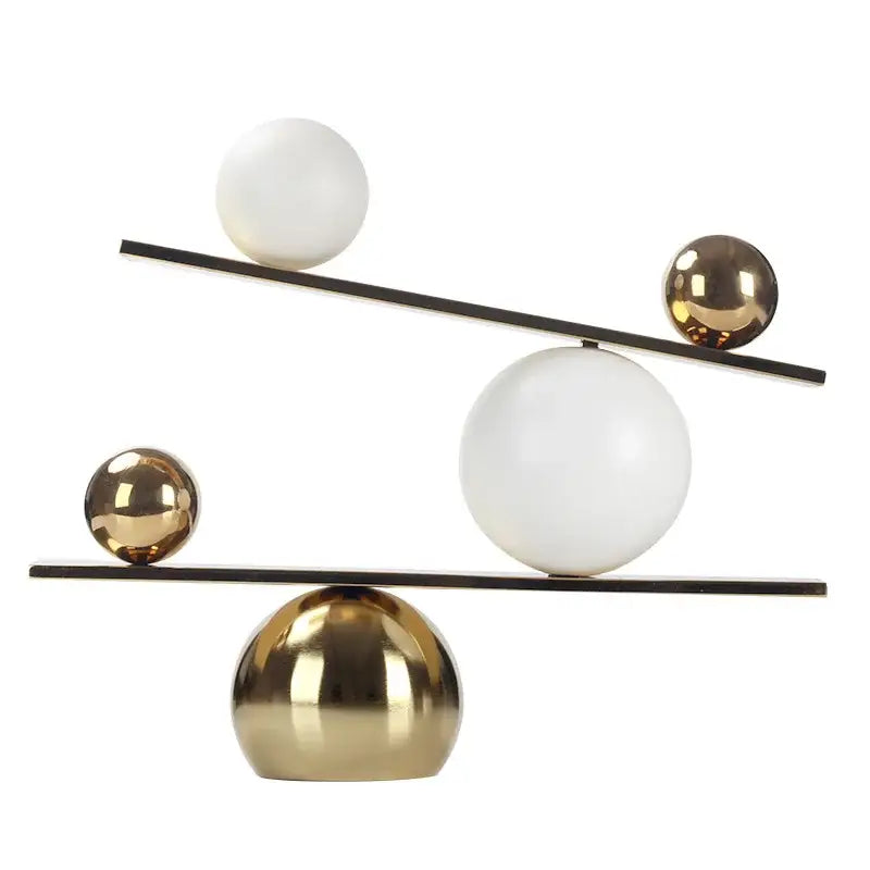 Modern geometric golden ball seesaw ramp living room sculpture
