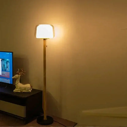 Modern glass floor lamp with wood pole for living room