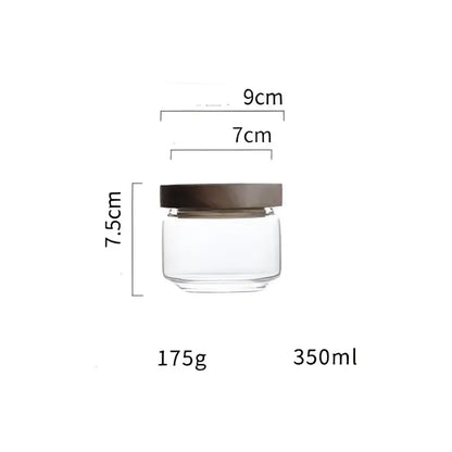 Modern glass hermetic storage jars with dark wood airtight lids kitchen