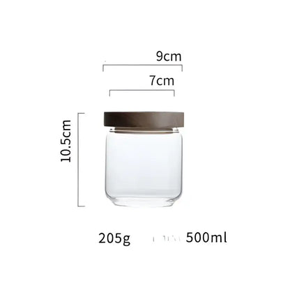 Modern glass hermetic storage jars with dark wood airtight lids kitchen