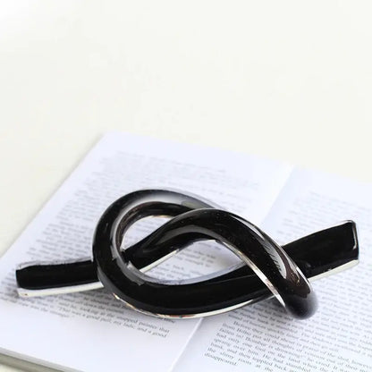 Modern glossy black geometric glass sculpture living room knot decor
