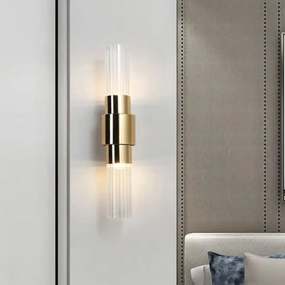 Modern gold 2 light sconce with clear ribbed glass for bathroom