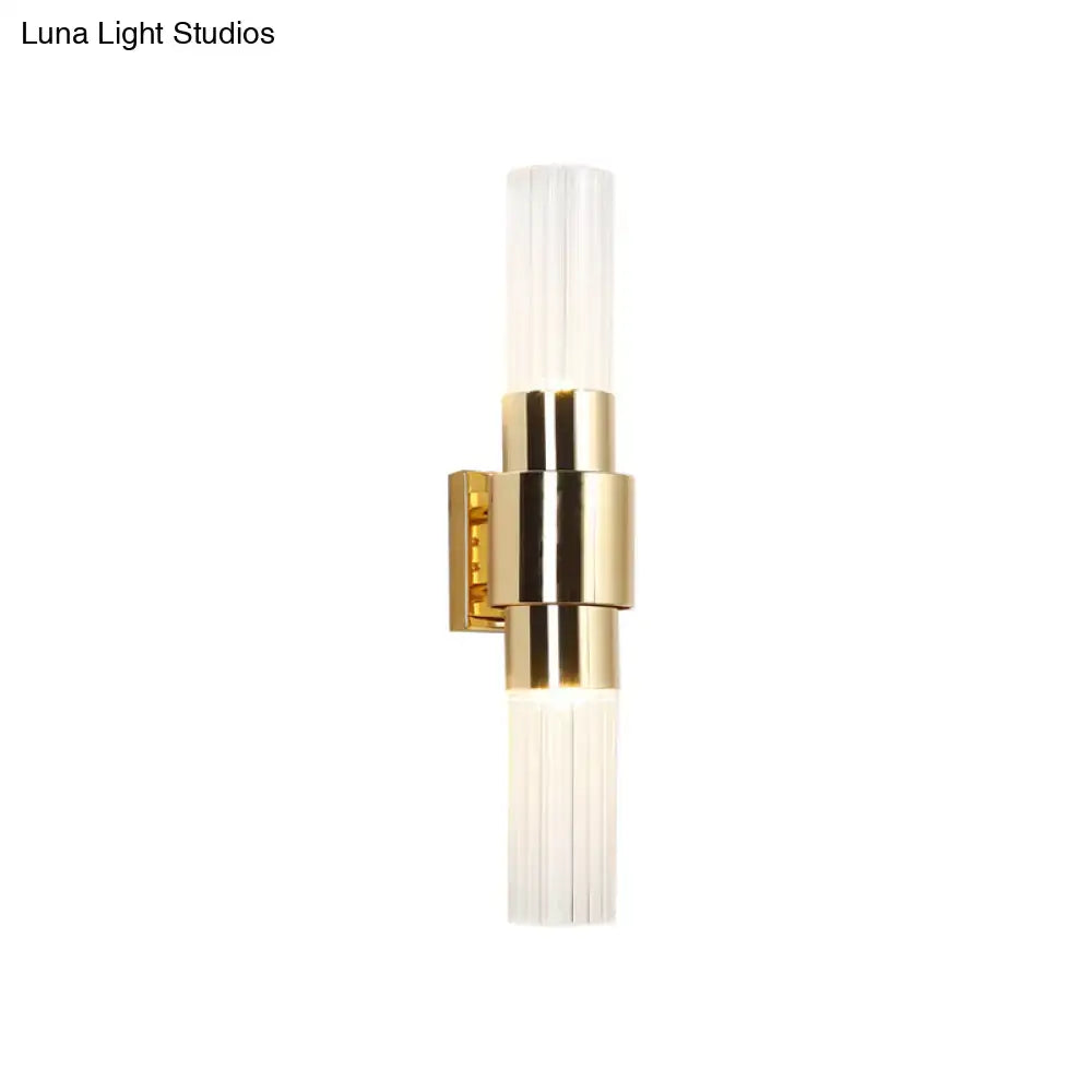 Modern gold 2 light sconce with clear ribbed glass for bathroom