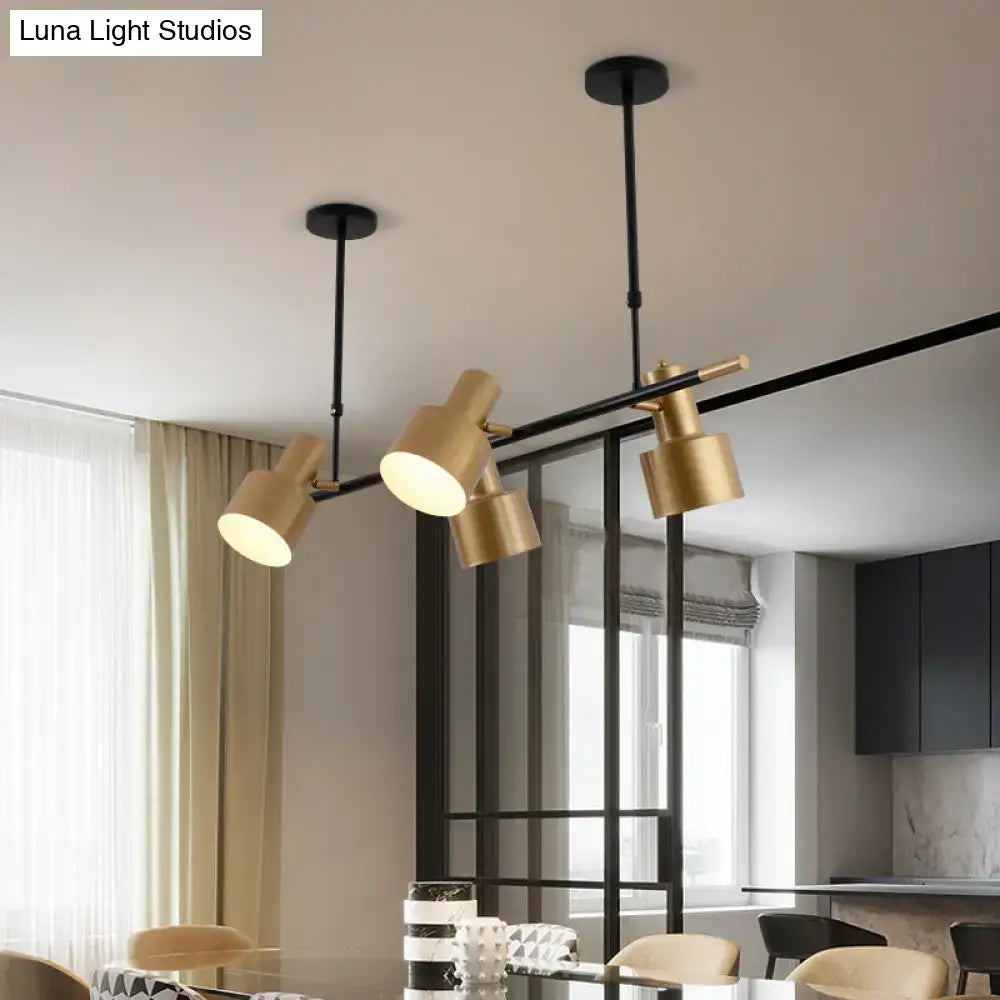 Modern gold and black drum pendant light for dining room island