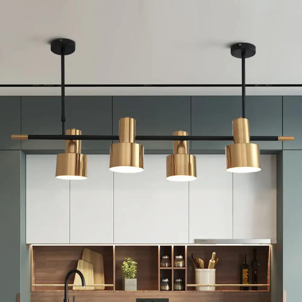 Modern gold and black drum pendant light for dining room island