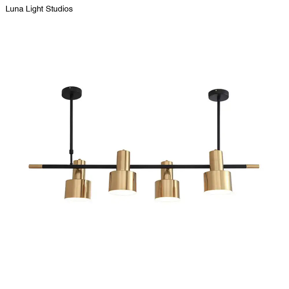 Modern gold and black drum pendant light for dining room island