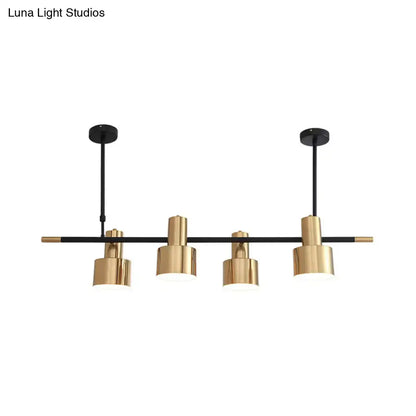 Modern gold and black drum pendant light for dining room island