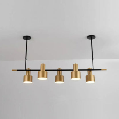 Modern gold and black drum pendant light for dining room island